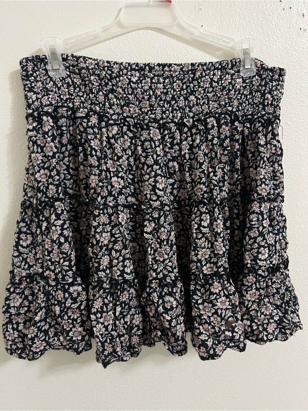 American Eagle smocked waist teired black and cream floral skirt